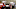 Closeup of two friends commenting and giving likes on social media platform via smartphone Closeup of two friends commenting and giving likes on social media platform via smartphone