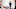 Happy man standing with vacuum cleaner in dining room at home Happy man standing with vacuum cleaner in dining room at home