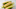A white bowl filled with sweet corn on the cob