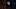 Teenager wearing spooky, glowing skull mask whilst standing on a darkened staircase Teenager wearing spooky, glowing skull mask whilst standing on a darkened staircase