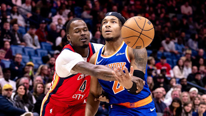 Dec 21, 2024; New Orleans, Louisiana, USA; New York Knicks guard Pacome Dadiet (4) is fouled by New Orleans Pelicans guard Javonte Green (4) during the first half at Smoothie King Center. Mandatory Credit: Stephen Lew-Imagn Images Dec 21, 2024; New Orleans, Louisiana, USA; New York Knicks guard Pacome Dadiet (4) is fouled by New Orleans Pelicans guard Javonte Green (4) during the first half at Smoothie King Center. Mandatory Credit: Stephen Lew-Imagn Images
