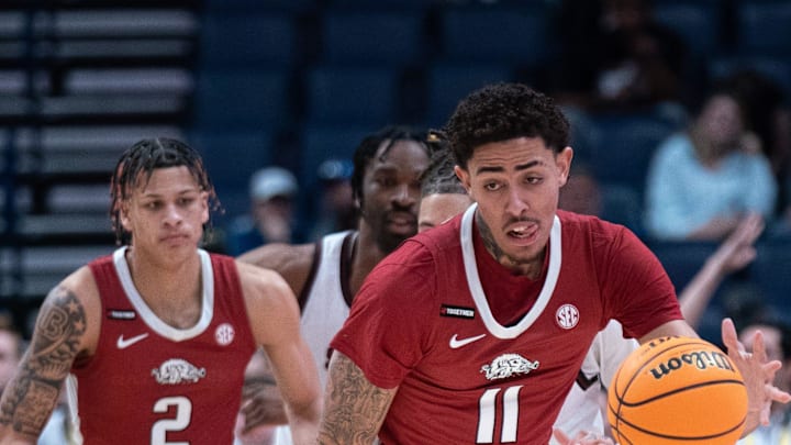 Arkansas Razorbacks forward Jalen Graham (11) leads the fast break against South Carolina during their second round game of the SEC Men's Basketball Tournament at Bridgestone Arena in Nashville, Tenn., Thursday, March 14, 2024.