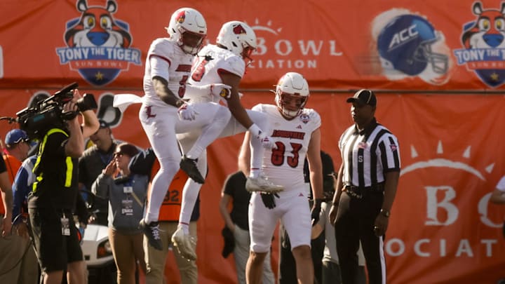 Louisville celebrates a touchdown during the 91st Tony the Tiger Sun Bowl game against Washington on Tuesday, Dec. 31, 2024 at the Sun Bowl Stadium in El Paso, Texas. Louisville celebrates a touchdown during the 91st Tony the Tiger Sun Bowl game against Washington on Tuesday, Dec. 31, 2024 at the Sun Bowl Stadium in El Paso, Texas.