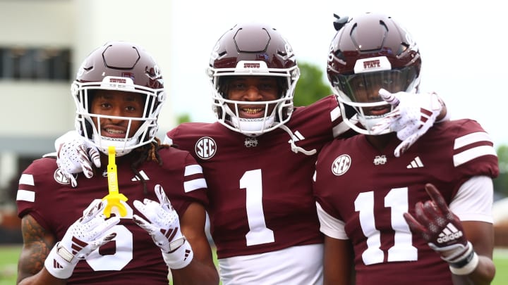 Mississippi State's Jaden Walley, Kelly Akharaiyi, and Kevin Coleman pose for a picture before the spring game.