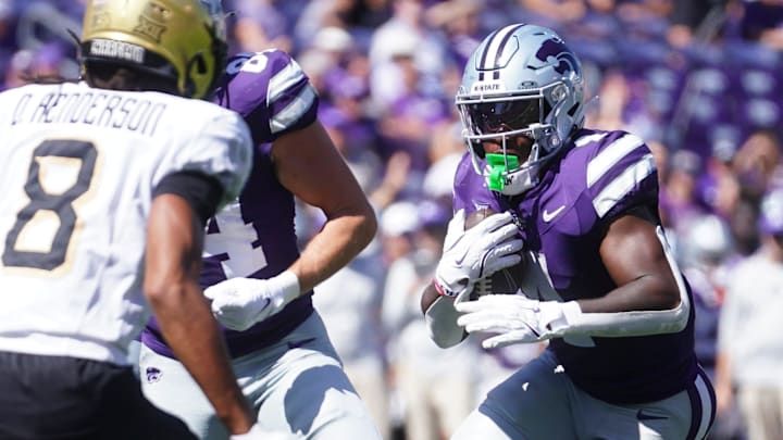 Kansas State Wildcats running back Joe Jackson (4) runs the ball during the second half of the game against UCF Knights at Bill Snyder Family Stadium on Sept. 27, 2025.