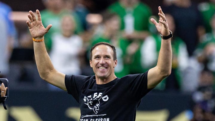 Sep 22, 2024; New Orleans, Louisiana, USA; Former New Orleans Saints quarterback Drew Brees pumps up the fans during the first half against the Philadelphia Eagles at Caesars Superdome. Mandatory Credit: Stephen Lew-Imagn Images