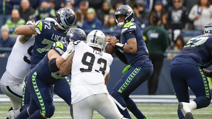 Nov 27, 2022; Seattle, Washington, USA; Seattle Seahawks quarterback Geno Smith (7) looks to pass against the Las Vegas Raiders during the second quarter at Lumen Field. 