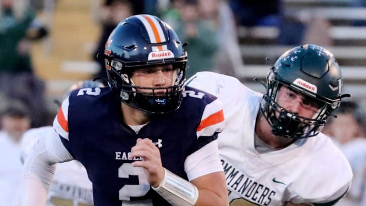 Nashville Christian's Jared Curtis (2)runs the option as Friendship Christian's Reid Powers (53) comes up fro, behind him during the BlueCross Bowl Division II-A Championship game at Finley Stadium, in Chattanooga, Tenn., on Thursday, Dec. 1, 2022.

34 Nashville Christian V Friendship Christian Football