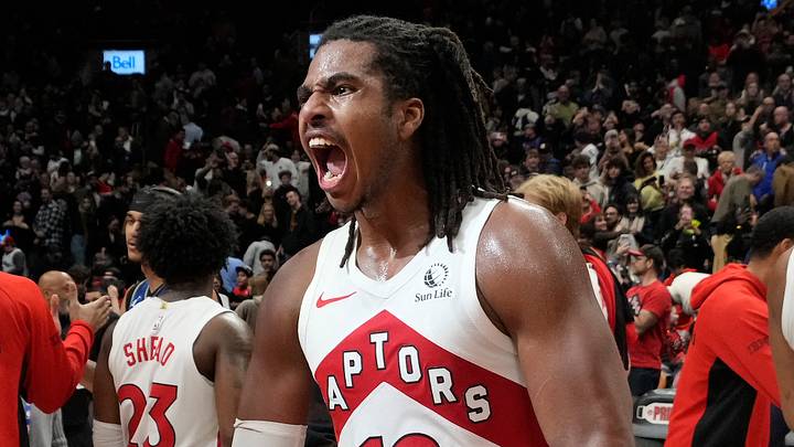Dec 29, 2025; Toronto, Ontario, CAN; Toronto Raptors forward Collin Murray-Boyles (12) reacts after a win over the Orlando Magic at Scotiabank Arena. Mandatory Credit: John E. Sokolowski-Imagn Images