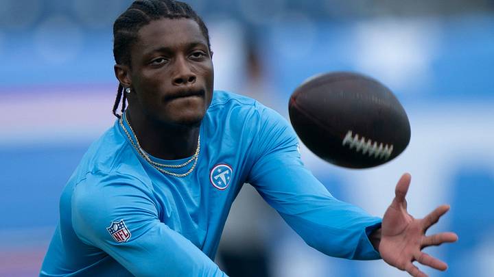 Tennessee wide receiver Carnell Tate (14) plays catch with wide receiver Xavier Restrepo during warmups before their preseason game against the Chicago Bears at Nissan Stadium Saturday, Aug. 29, 2026. Tennessee wide receiver Carnell Tate (14) plays catch with wide receiver Xavier Restrepo during warmups before their preseason game against the Chicago Bears at Nissan Stadium Saturday, Aug. 29, 2026.