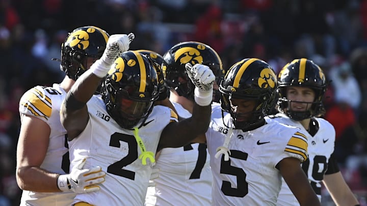 Nov 23, 2024; College Park, Maryland, USA;  Iowa Hawkeyes running back Kaleb Johnson (2) celebrates after scoring a touchdown during the first half against the Maryland Terrapins at SECU Stadium. Mandatory Credit: Tommy Gilligan-Imagn Images