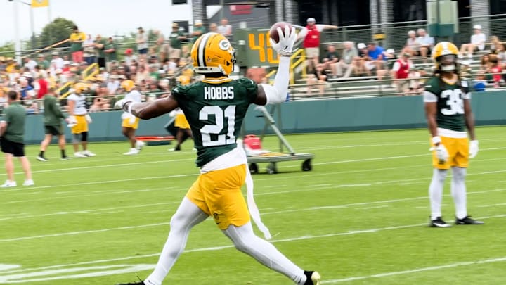 Nate Hobbs intercepts a pass during drills at Packers training camp. Nate Hobbs intercepts a pass during drills at Packers training camp.
