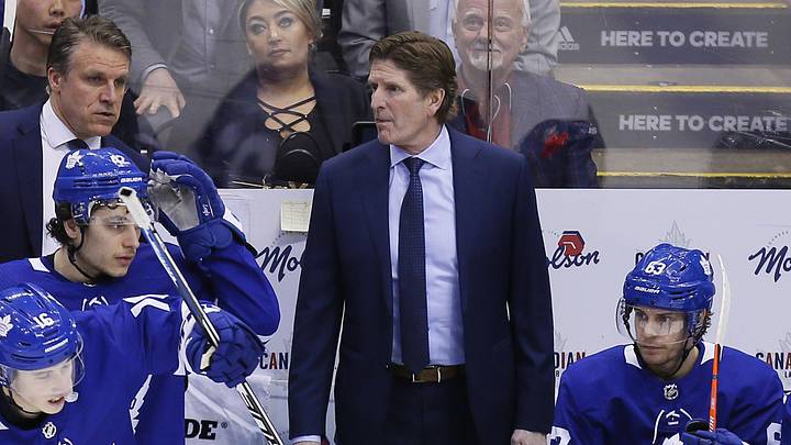 Apr 17, 2019; Toronto, Ontario, CAN; Toronto Maple Leafs head coach Mike Babcock (center) looks on from the bench during game four of the first round of the 2019 Stanley Cup Playoffs against the Boston Bruins at Scotiabank Arena. Boston defeated Toronto. Mandatory Credit: John E. Sokolowski-Imagn Images Apr 17, 2019; Toronto, Ontario, CAN; Toronto Maple Leafs head coach Mike Babcock (center) looks on from the bench during game four of the first round of the 2019 Stanley Cup Playoffs against the Boston Bruins at Scotiabank Arena. Boston defeated Toronto. Mandatory Credit: John E. Sokolowski-Imagn Images