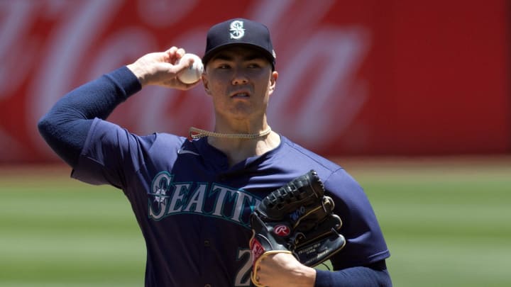 Seattle Mariners starting pitcher Bryan Woo (22) delivers a pitch against the Oakland Athletics during the first inning at Oakland-Alameda County Coliseum. Seattle Mariners starting pitcher Bryan Woo (22) delivers a pitch against the Oakland Athletics during the first inning at Oakland-Alameda County Coliseum.