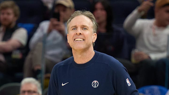 Jan 18, 2025; San Francisco, California, USA; Washington Wizards head coach Brian Keefe watches game play against the Golden State Warriors during the third quarter at Chase Center. Mandatory Credit: Robert Edwards-Imagn Images