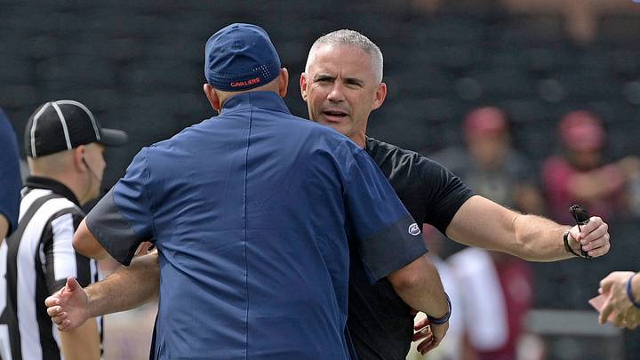 Oct 3, 2026; Tallahassee, Florida, USA; Virginia Cavaliers head coach Tony Elliott talks with Florida State Seminoles head coach Mike Norvell before the game at Doak S. Campbell Stadium. Mandatory Credit: Melina Myers-Imagn Images Oct 3, 2026; Tallahassee, Florida, USA; Virginia Cavaliers head coach Tony Elliott talks with Florida State Seminoles head coach Mike Norvell before the game at Doak S. Campbell Stadium. Mandatory Credit: Melina Myers-Imagn Images