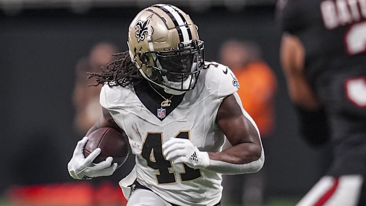 Sep 29, 2024; Atlanta, Georgia, USA; New Orleans Saints running back Alvin Kamara (41) runs against the Atlanta Falcons at Mercedes-Benz Stadium. Mandatory Credit: Dale Zanine-Imagn Images
