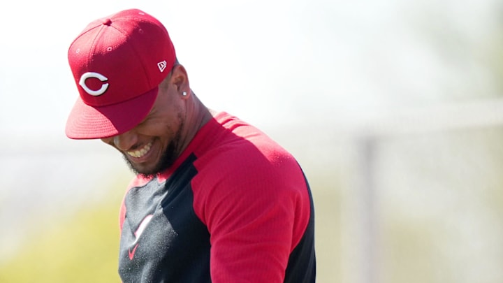 Cincinnati Reds pitcher Frankie Montas smiles during fielding drills