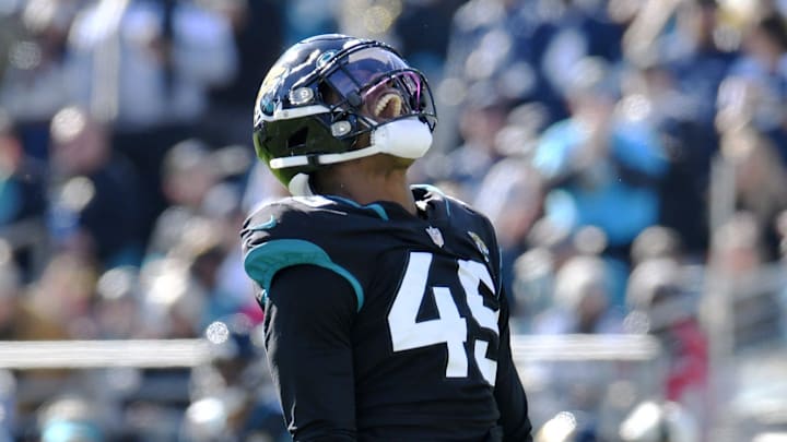 Jacksonville Jaguars defensive end Arden Key (49) celebrates after an early first quarter sack on Dallas Cowboys quarterback Dak Prescott (4). The Jacksonville Jaguars hosted the Dallas Cowboys at TIAA Bank Field Sunday, December 18, 2022. The Jaguars trailed 21 to 7 at the half. Jacksonville Jaguars defensive end Arden Key (49) celebrates after an early first quarter sack on Dallas Cowboys quarterback Dak Prescott (4). The Jacksonville Jaguars hosted the Dallas Cowboys at TIAA Bank Field Sunday, December 18, 2022. The Jaguars trailed 21 to 7 at the half.