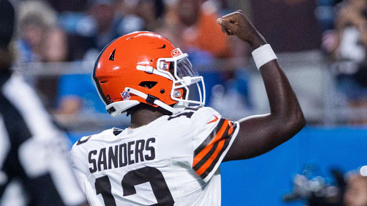 Aug 8, 2025; Charlotte, North Carolina, USA; Cleveland Browns quarterback Shedeur Sanders (12) celebrates after a touchdown in the second quarter against the Carolina Panthers at Bank of America Stadium. Mandatory Credit: Scott Kinser-The USAToday Network via Imagn Images 