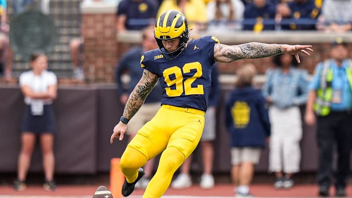 Michigan place kicker Beckham Sunderland (92) kicks off against Central Michigan during the first half against at Michigan Stadium in Ann Arbor on Saturday, Sept. 13, 2025. Michigan place kicker Beckham Sunderland (92) kicks off against Central Michigan during the first half against at Michigan Stadium in Ann Arbor on Saturday, Sept. 13, 2025.