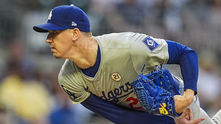 Sep 15, 2024; Cumberland, Georgia, USA; Los Angeles Dodgers starting pitcher Walker Buehler (21) pitches against the Atlanta Braves during the first inning at Truist Park. Mandatory Credit: Dale Zanine-Imagn Images Sep 15, 2024; Cumberland, Georgia, USA; Los Angeles Dodgers starting pitcher Walker Buehler (21) pitches against the Atlanta Braves during the first inning at Truist Park. Mandatory Credit: Dale Zanine-Imagn Images