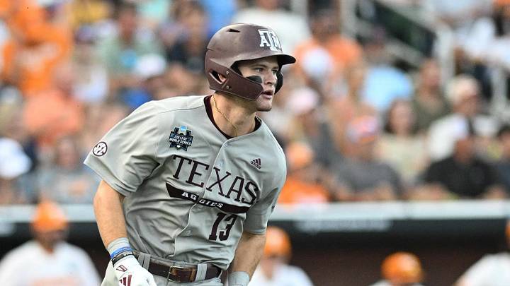 Texas A&M Aggies left fielder Caden Sorrell (13) drives in a run against the Tennessee Volunteers during the first inning at Charles Schwab Field Omaha.