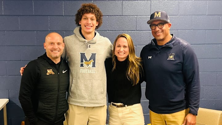P.J. Fleck (left) visiting Mason Bonner (second-to-left) at his high school. P.J. Fleck (left) visiting Mason Bonner (second-to-left) at his high school.