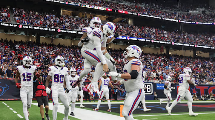 Oct 6, 2024; Houston, Texas, USA; Buffalo Bills quarterback Josh Allen (17) celebrates wide receiver Keon Coleman's (0) touchdown against the Buffalo Bills at NRG Stadium. Oct 6, 2024; Houston, Texas, USA; Buffalo Bills quarterback Josh Allen (17) celebrates wide receiver Keon Coleman's (0) touchdown against the Buffalo Bills at NRG Stadium.