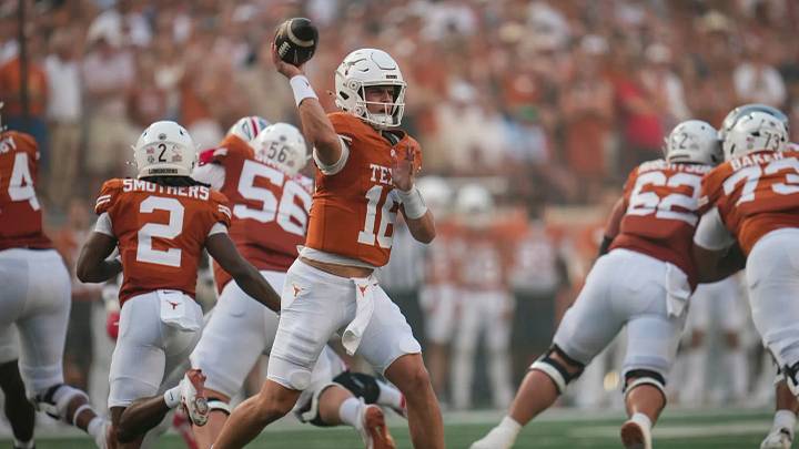 Texas Longhorns quarterback Arch Manning throws during the NCAA football game against the Ohio State Buckeyes Texas Longhorns quarterback Arch Manning throws during the NCAA football game against the Ohio State Buckeyes