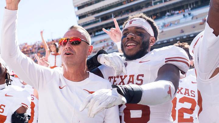 Texas coach Steve Sarkisian and linebacker Justin Cryer sing “The Eyes of Texas” with his team after a college football game between Tennessee and Texas at Neyland Stadium in Knoxville, Tenn. on Sept. 26, 2026. Texas coach Steve Sarkisian and linebacker Justin Cryer sing “The Eyes of Texas” with his team after a college football game between Tennessee and Texas at Neyland Stadium in Knoxville, Tenn. on Sept. 26, 2026.