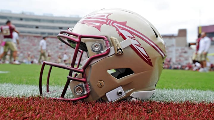 Oct 7, 2017; Tallahassee, FL, USA; View of a Florida State Seminoles helmet on the field before the game against the Miami Hurricanes at Doak Campbell Stadium. Mandatory Credit: Melina Vastola-Imagn Images / Melina Vastola-Imagn Imag Oct 7, 2017; Tallahassee, FL, USA; View of a Florida State Seminoles helmet on the field before the game against the Miami Hurricanes at Doak Campbell Stadium. Mandatory Credit: Melina Vastola-Imagn Images / Melina Vastola-Imagn Imag