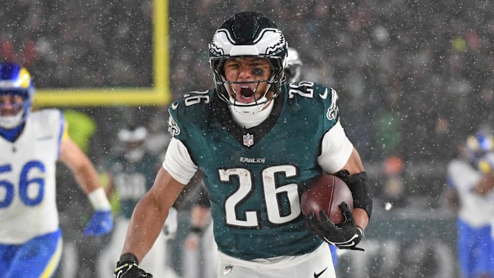 Philadelphia Eagles running back Saquon Barkley (26) runs for on a 78-yard touchdown run against the Los Angeles Rams during the fourth quarter in a 2025 NFC divisional round game at Lincoln Financial Field. 