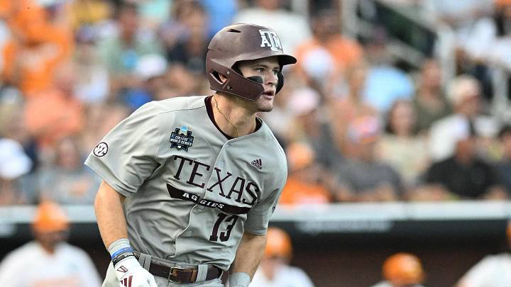 Texas A&M Aggies left fielder Caden Sorrell (13) drives in a run against the Tennessee Volunteers during the first inning at Charles Schwab Field Omaha.