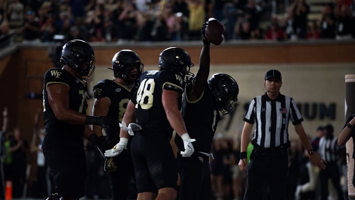 Wake Forest Demon Deacons celebrating in the end zone