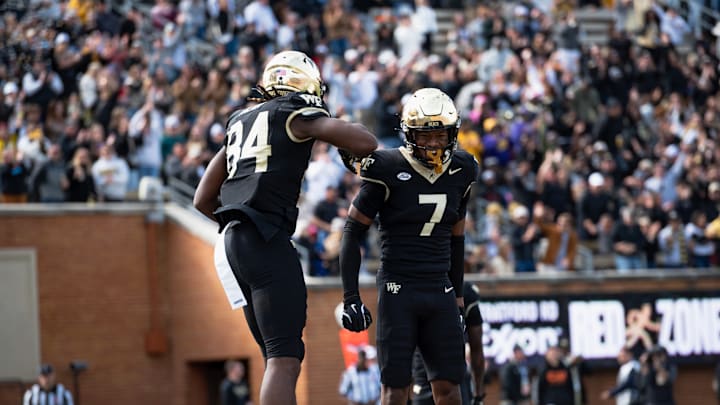Eni Falayi and Micah Mays celebrate for the Deacs against SMU Eni Falayi and Micah Mays celebrate for the Deacs against SMU