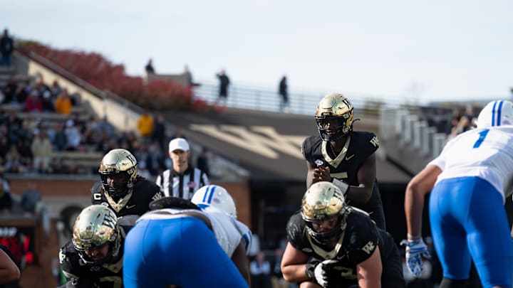Wake Forest quarterback Deshawn Purdie (5) taking a snap against the SMU Mustangs, Oct. 25, 2025. Wake Forest quarterback Deshawn Purdie (5) taking a snap against the SMU Mustangs, Oct. 25, 2025.