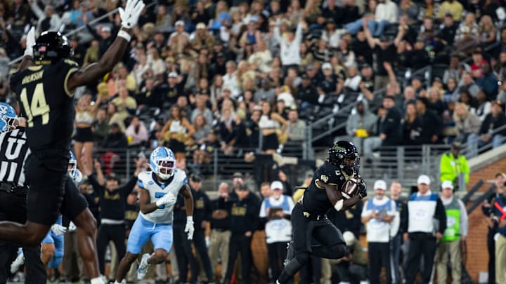 Demond Claiborne scores a rushing touchdown for Wake Forest
