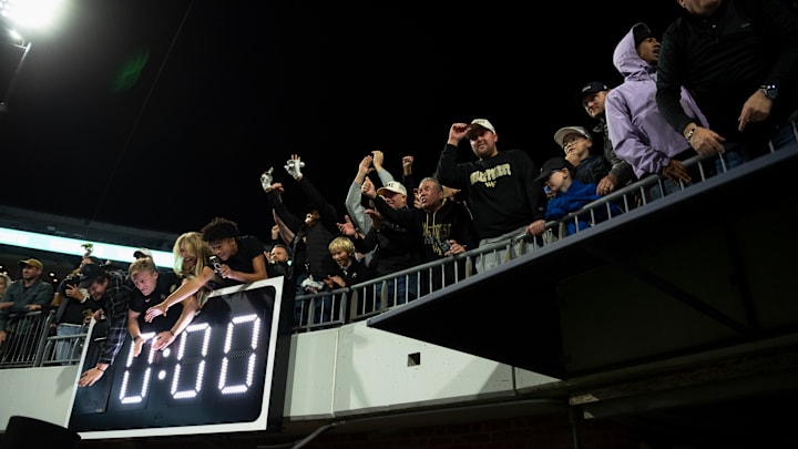 Wake Forest fans celebrate victory over the Virginia Cavaliers 