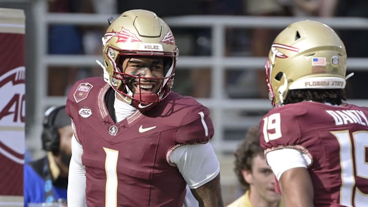 Aug 30, 2025; Tallahassee, Florida, USA; Florida State Seminoles quarterback Tommy Castellanos (1) celebrates with wide receiver Micahi Danzy (19) after a touchdown against the Alabama Crimson Tide during the second half at Doak S. Campbell Stadium. Mandatory Credit: Melina Myers-Imagn Images