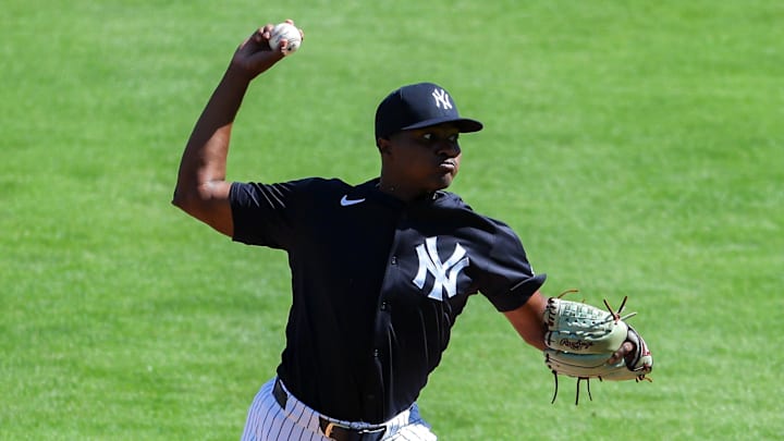 Feb 15, 2025; Tampa, FL, USA; New York Yankees relief pitcher Yerry de los Santos (73) participates in spring training workouts at George M. Steinbrenner Field.