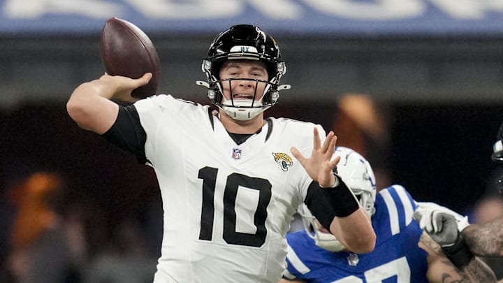 Jan 5, 2025; Indianapolis, Indiana, USA; Jacksonville Jaguars quarterback Mac Jones (10) passes the ball during a game against the Indianapolis Colts at Lucas Oil Stadium. Mandatory Credit: Christine Tannous/USA TODAY Network via Imagn Images