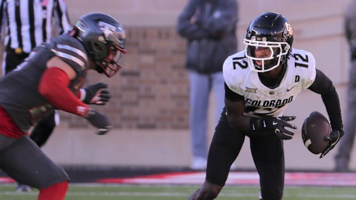 Colorado's Travis Hunter runs after a catch against Texas Tech in a Big 12 football game Saturday, Nov. 9, 2024, at Jones AT&T Stadium.