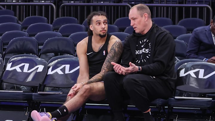 Jan 25, 2025; New York, New York, USA;  Sacramento Kings guard Devin Carter (22) talks with assistant coach Jim Moran prior to the game against the New York Knicks at Madison Square Garden. Mandatory Credit: Wendell Cruz-Imagn Images