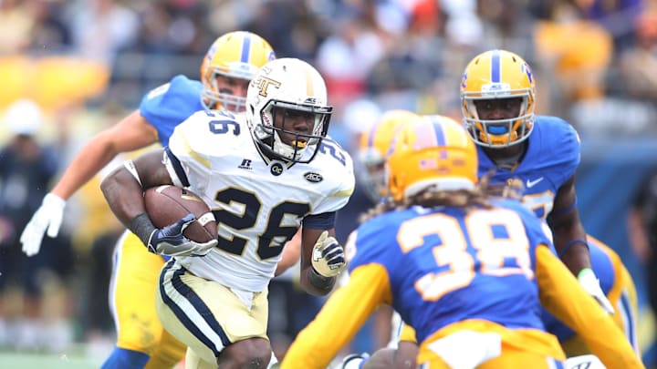 Oct 8, 2016; Pittsburgh, PA, USA;  Georgia Tech Yellow Jackets running back Dedrick Mills (26) rushes the ball against the Pittsburgh Panthers during the second quarter at Heinz Field. PITT won 37-34. Mandatory Credit: Charles LeClaire-Imagn Images