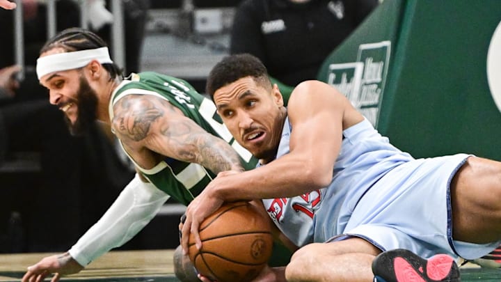 Dec 21, 2024; Milwaukee, Wisconsin, USA; Washington Wizards guard Malcolm Brogdon (15) and Milwaukee Bucks guard Gary Trent Jr. (5) battle for a loose ball in the second quarter at Fiserv Forum. Mandatory Credit: Benny Sieu-Imagn Images Dec 21, 2024; Milwaukee, Wisconsin, USA; Washington Wizards guard Malcolm Brogdon (15) and Milwaukee Bucks guard Gary Trent Jr. (5) battle for a loose ball in the second quarter at Fiserv Forum. Mandatory Credit: Benny Sieu-Imagn Images