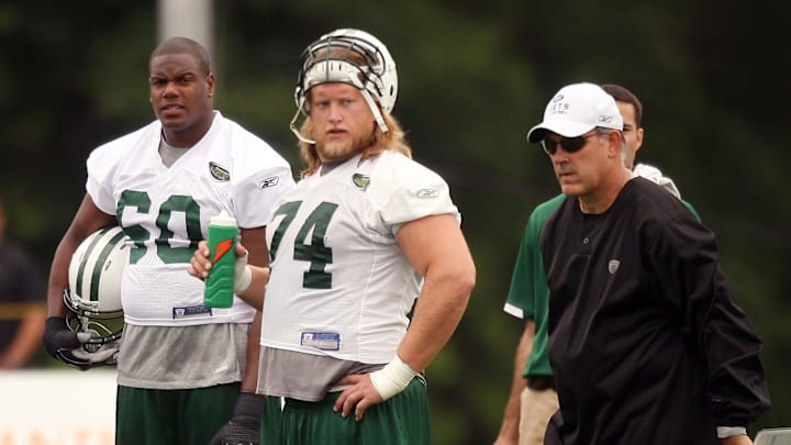 Florham Park, June 14, 2010 --New York Jets Tackle D'Brickashaw Ferguson, l, and center Nick Mangold take a break during Jets Mini Camp at their Atlantic Health training facility in Florham Park. Florham Park, June 14, 2010 --New York Jets Tackle D'Brickashaw Ferguson, l, and center Nick Mangold take a break during Jets Mini Camp at their Atlantic Health training facility in Florham Park.