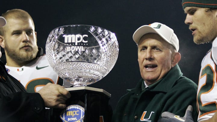 Dec 31, 2006; Boise, ID, USA; Miami Hurricanes head coach Larry Coker accepts the trophy after defeating the Nevada Wolf Pack 21-20 in his last game as coach in the MPC Computers Bowl at Bronco Stadium in Boise, Idaho. Mandatory Credit: Rick Scuteri-US Presswire Copyright Rick Scuteri 