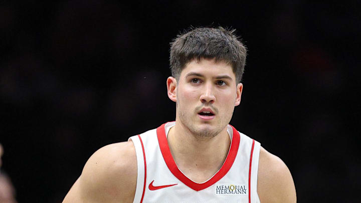 Jan 1, 2026; Brooklyn, New York, USA; Houston Rockets guard Reed Sheppard (15) reacts after making a basket during the first half against the Brooklyn Nets at Barclays Center. Mandatory Credit: Vincent Carchietta-Imagn Images