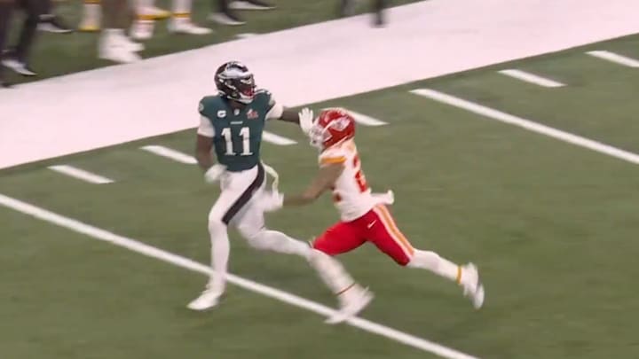 Philadelphia Eagles wide receiver A.J. Brown jostles with Kansas City Chiefs cornerback Trent McDuffie during Super Bowl LIX.